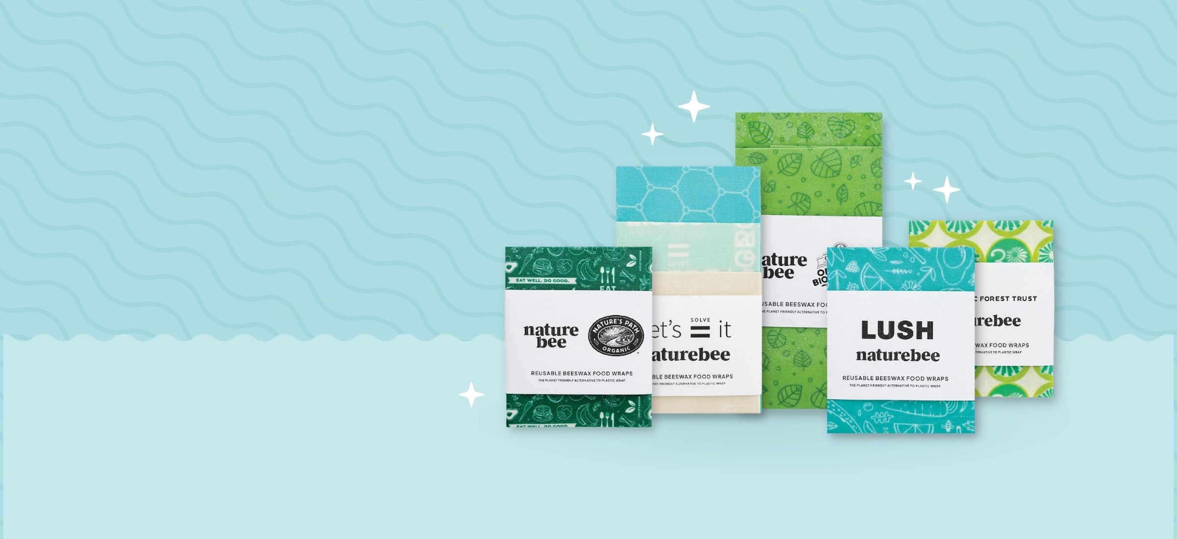 Blue background with sparkles and squiggles. Images of Custom Beeswax Wraps from various brands. Put your own artwork or logo on these beeswax wraps. Customize beeswax wraps with your branding and designs. Five sets of custom beeswax wraps in various colours and designs including hand drawn icons, leaves, hexagons, anniversary gift.